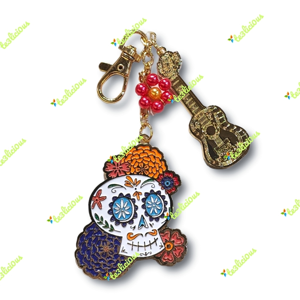 DISNEY PARKS COCO SUGAR SKULL KEYCHAIN - Picture 1 of 2